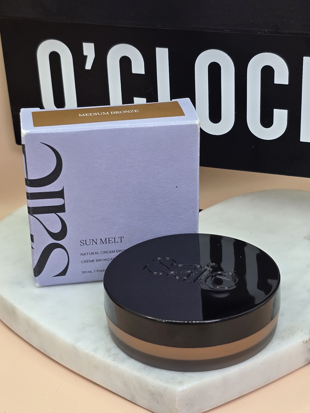 Saie Sun Melt Cream Bronzer in Medium Bronze with Black Compact
